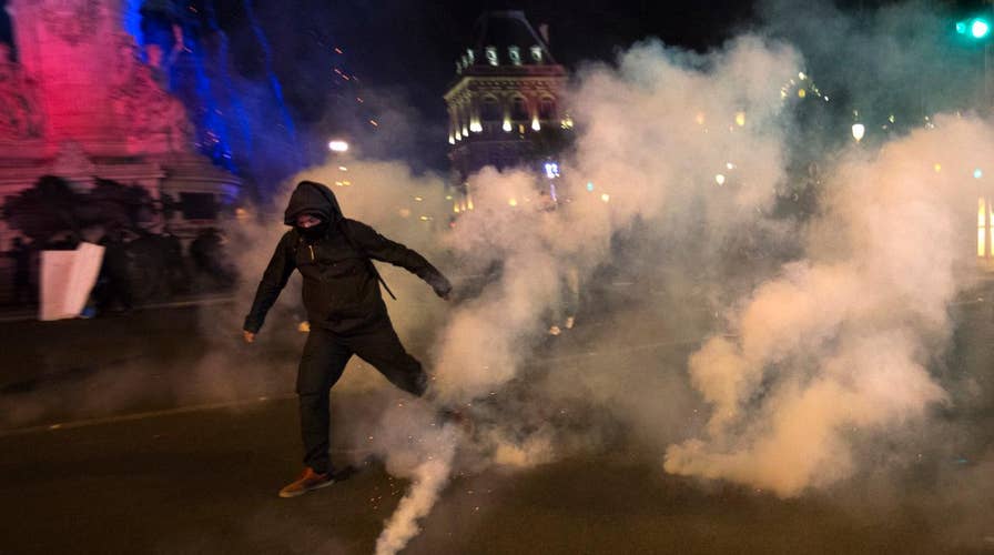 Protesters clash with police following French election