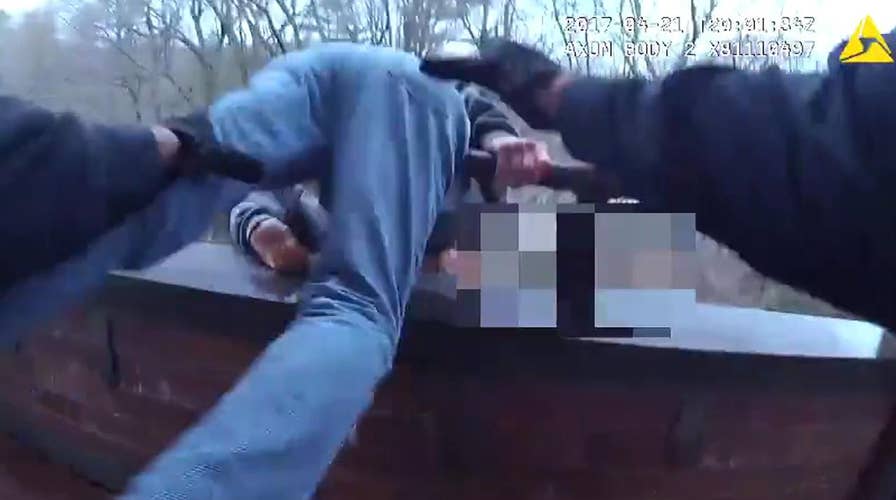 Cop chases, stops man from jumping off sixth-floor balcony