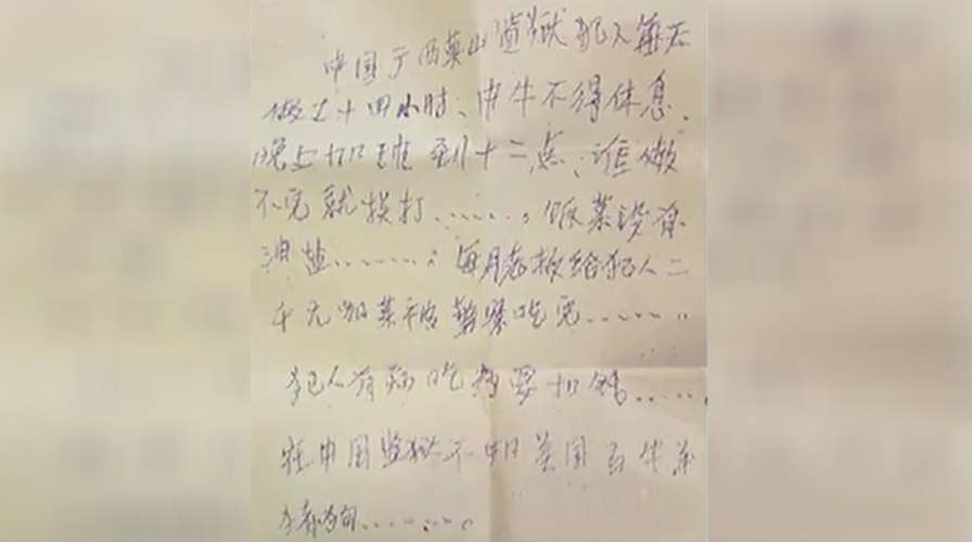 Woman finds note from Chinese prisoner in purse