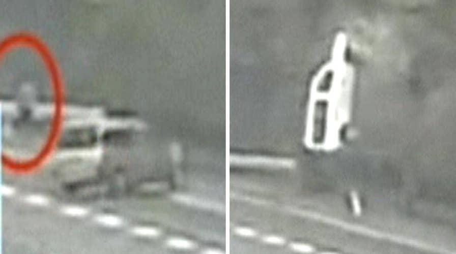 Out-of-control bus nearly hits pedestrian in dramatic crash