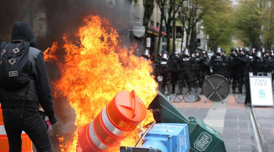 Anarchists clash with police during May Day protests