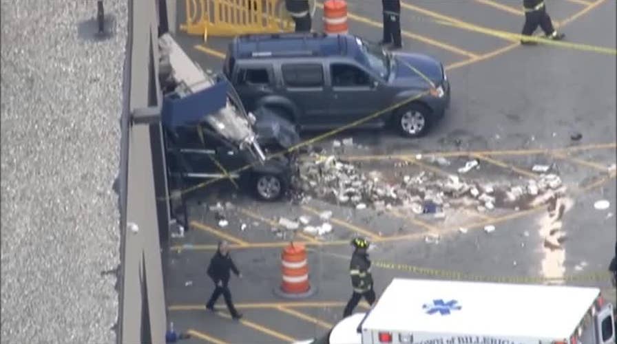 Car plows into crowd at Massachusetts auto auction