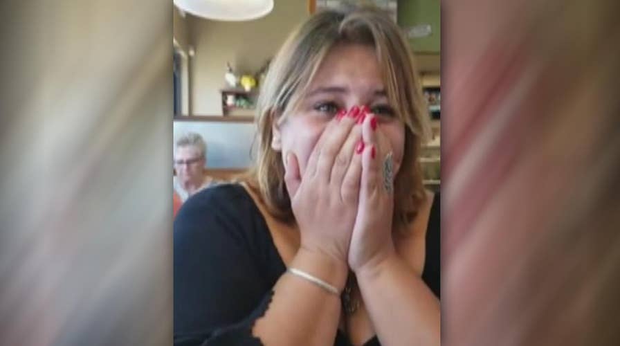 Woman cries tears of joy after 16-year-wait for green card