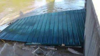 Midwest floods: House crashes into Arkansas bridge after severe storms