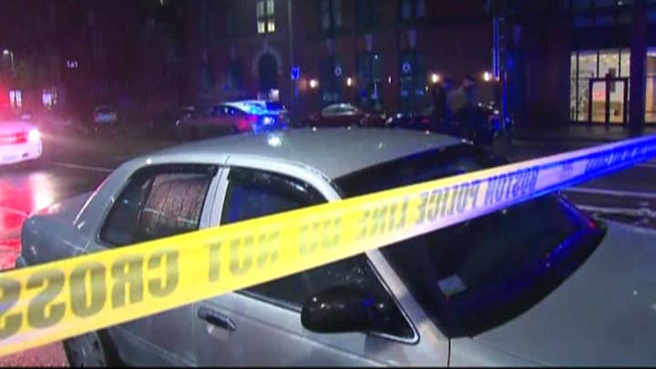 Police search for motive in double murder of Boston doctors
