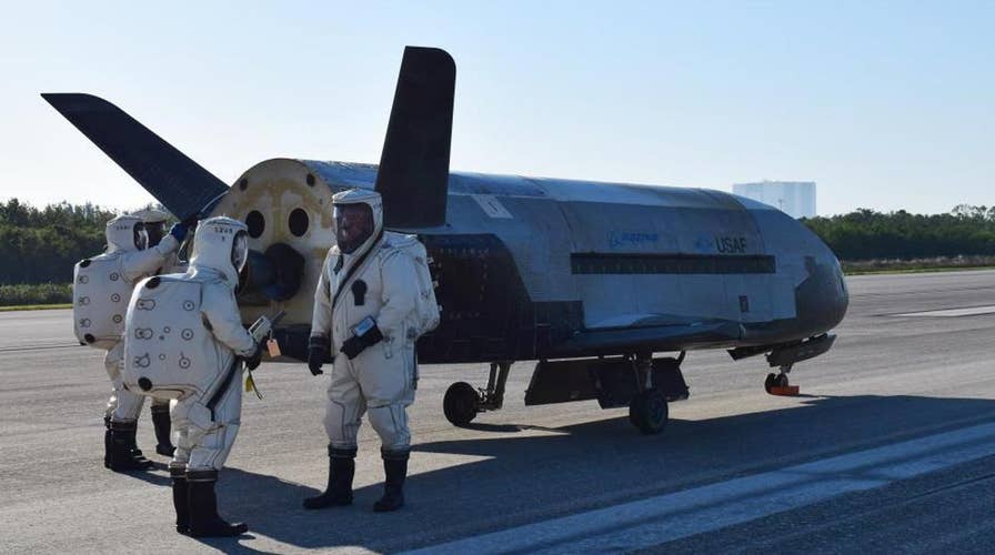 Secret US space plane lands after 2-year classified mission