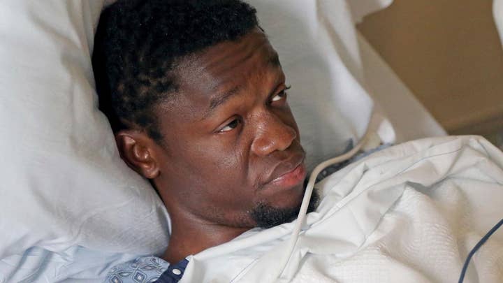 Suspect in murder of Boston doctors held without bail