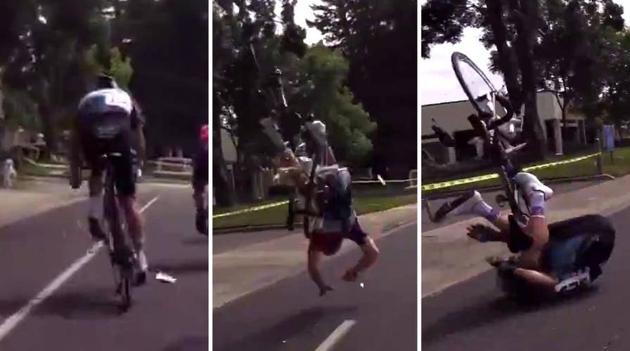 Cyclist flips over handlebars after getting hit by drone