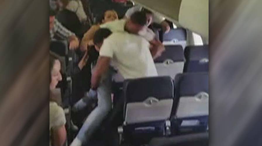 Passengers trade punches during violent brawl on plane