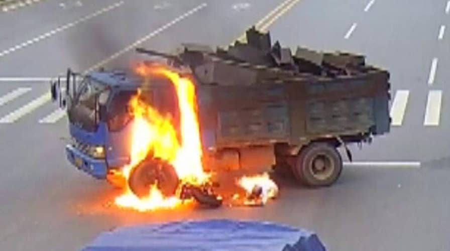 Warning, graphic content: Biker escapes fiery crash