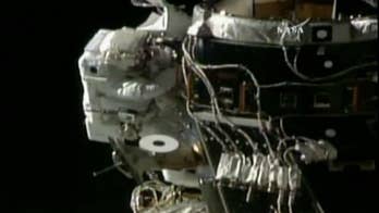 200th spacewalk starts with a glitch, then ends up making history