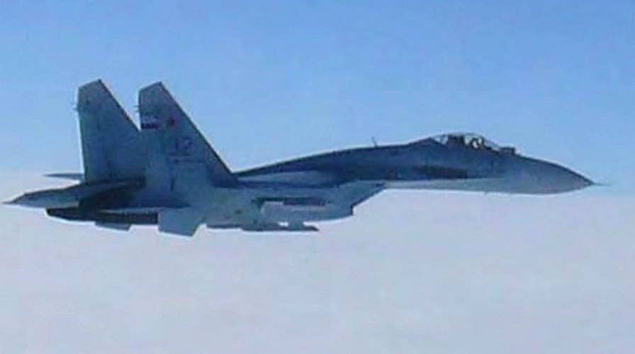 Russian fighter jet spotted twenty feet from US Navy plane