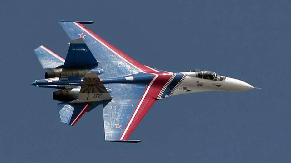 Russian Fighter Jet Flies Close To Us Navy Aircraft