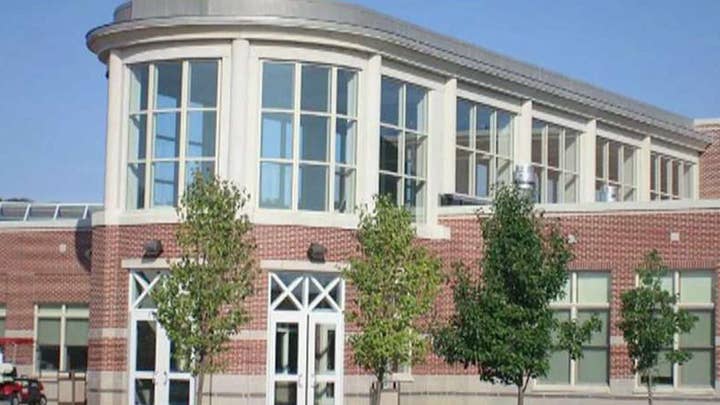 Teacher accused of imposing religious beliefs on co-worker