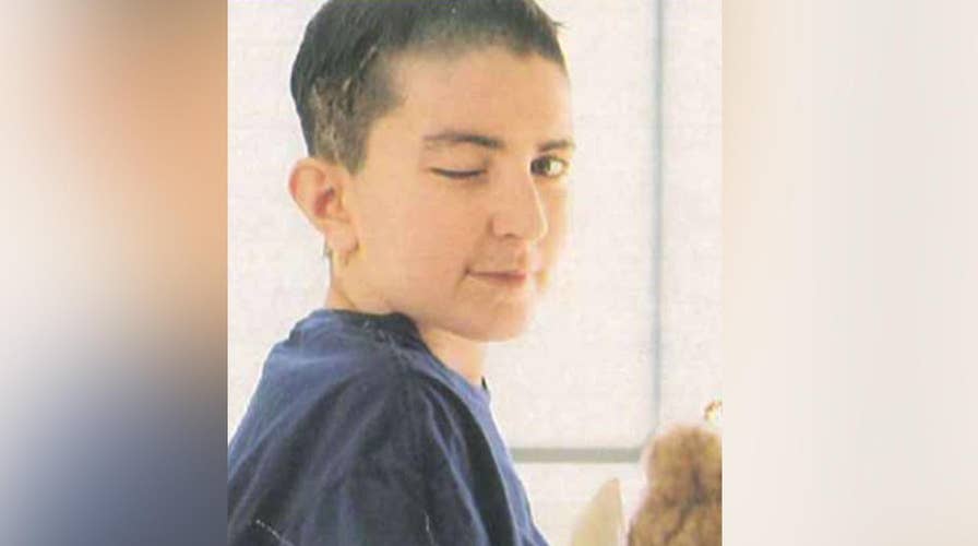 Brain cancer survivor defies odds