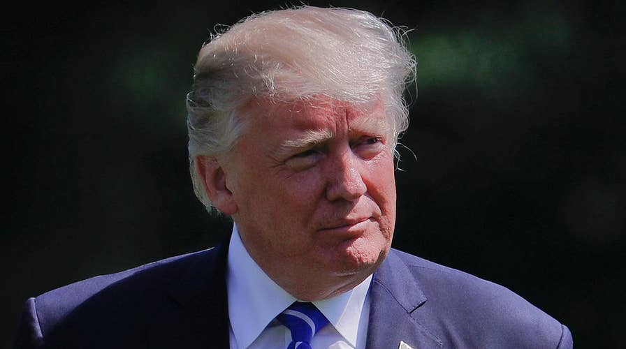 Trump doubles down denial on ties to Russia