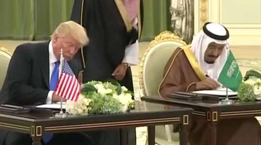 President Trump and Saudi King Salman sign agreements