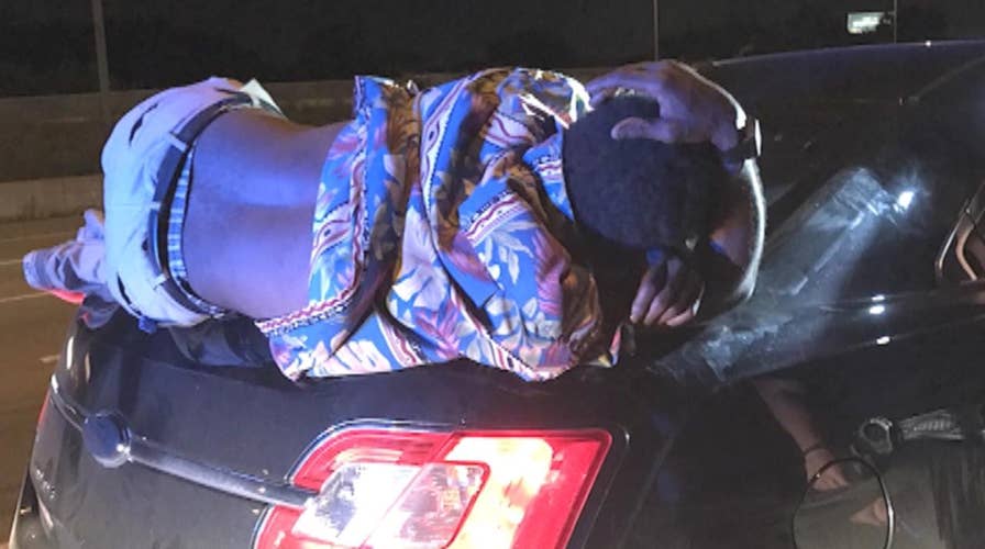 Cop stops driver: Do you know you have a drunk on the trunk?