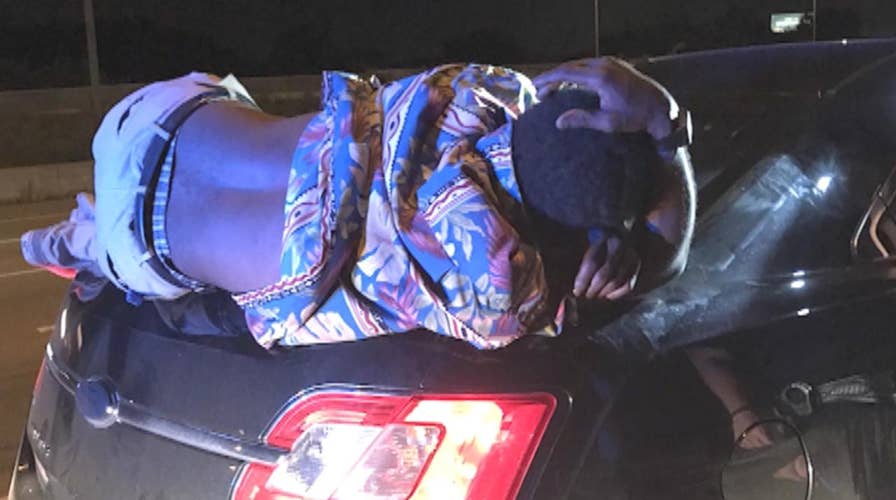 Cop stops driver: Do you know you have a drunk on the trunk?