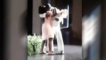 Navy dad surprises daughter at Georgia elementary school graduation