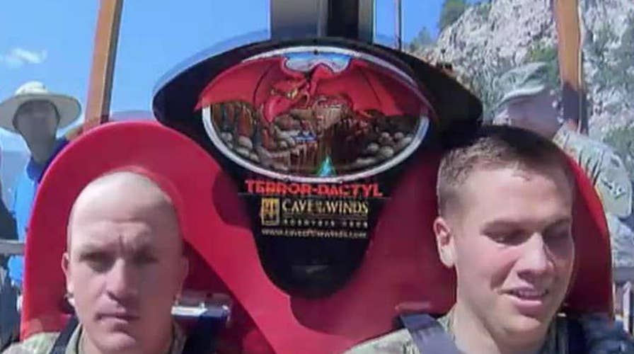 Soldiers take re-enlistment oath before thrill ride plunge