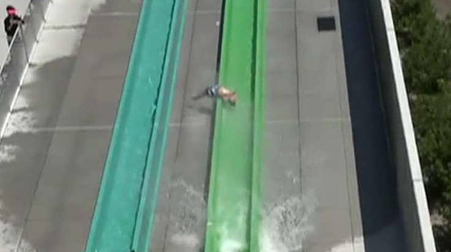 10-year-old boy falls off water slide