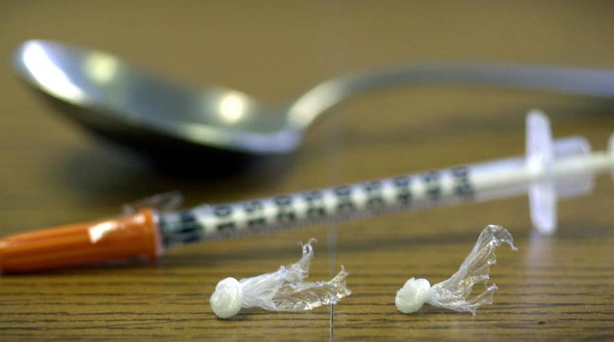 Addiction in America: Don't jail opioid abusers?