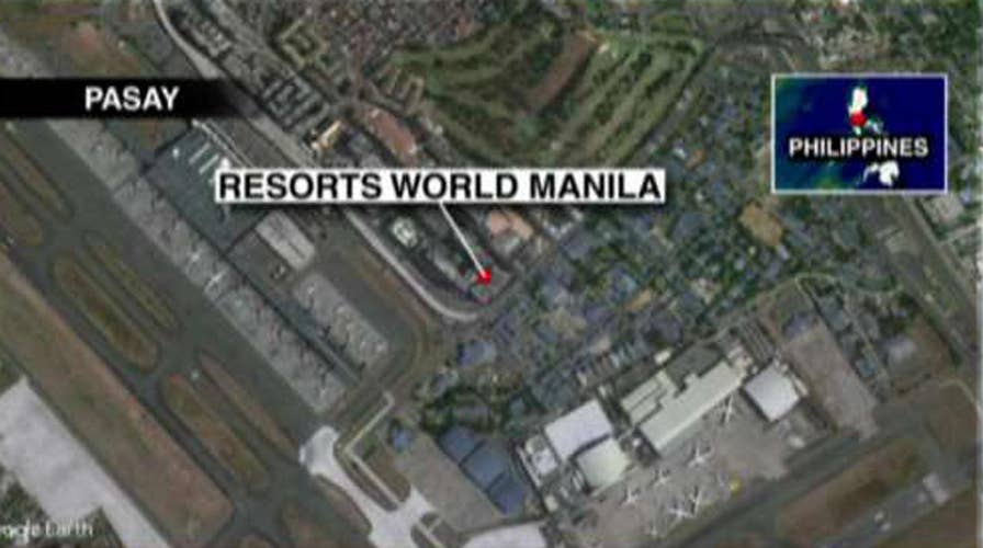 Reports: Men in black hoods stormed Manila resort
