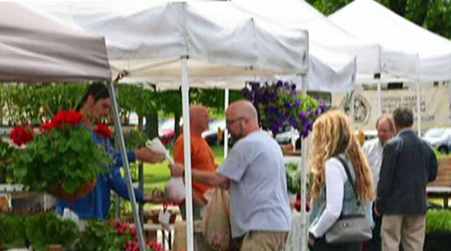 Farmers banned from market over religious beliefs