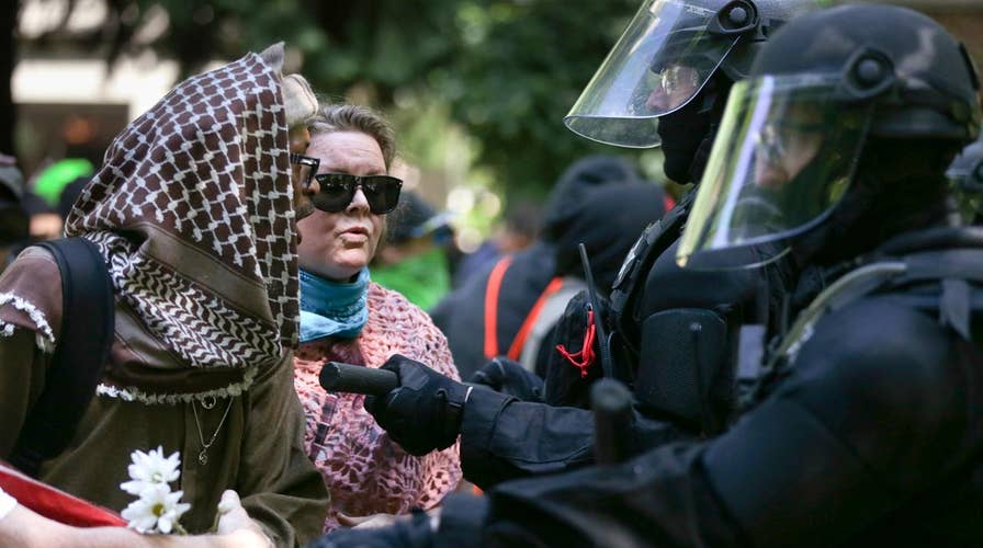 14 arrested, weapons seized after violent Portland protests