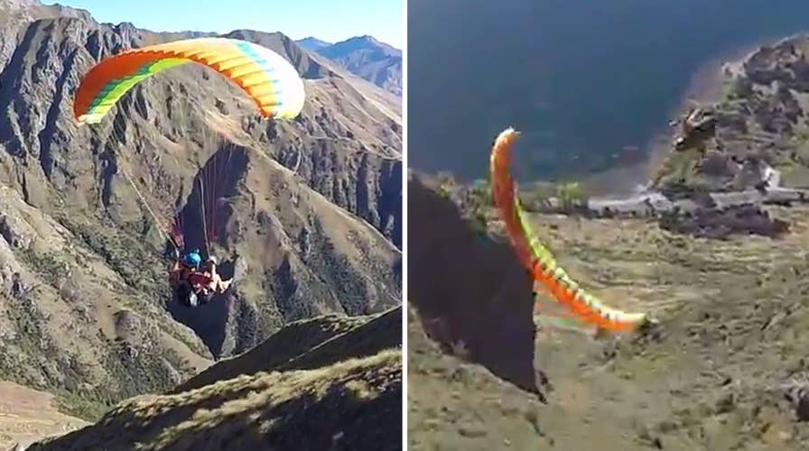 Daredevils graze mountain peaks, perform full rotations