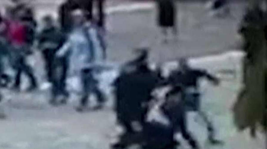 Paris hammer attack caught on surveillance video