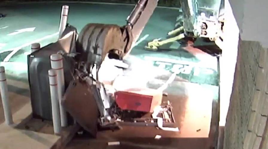 Suspect uses stolen backhoe try to rob ATM