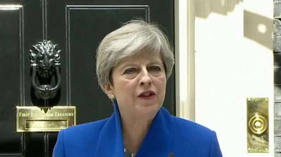 May vows not to resign after her historic miscalculation