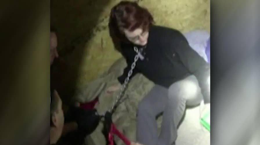 Cops save woman chained in metal container by serial killer