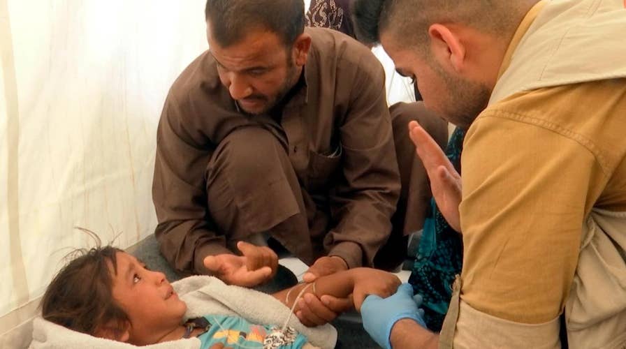 Food poisoning outbreak at camp for displaced people in Iraq