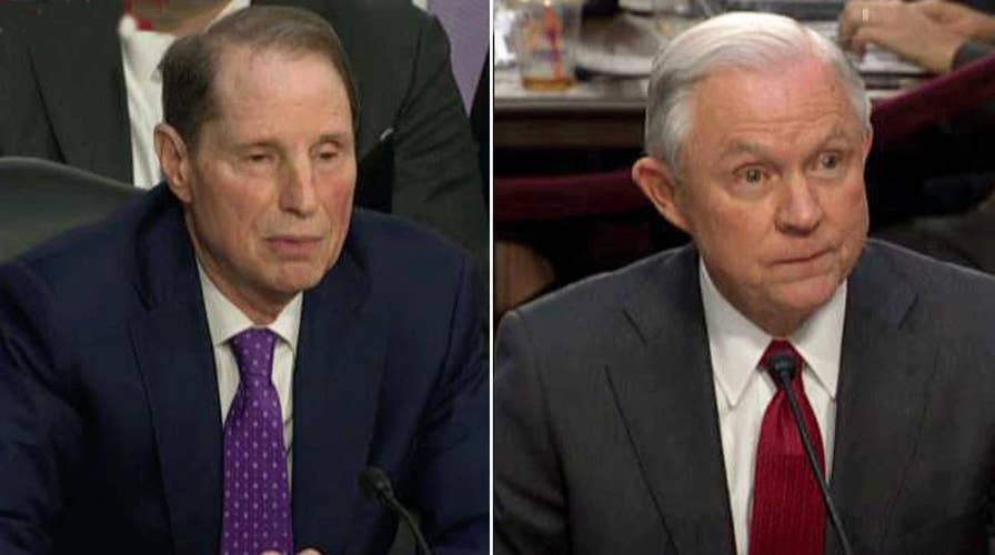 Jeff Sessions spars with Sen. Wyden