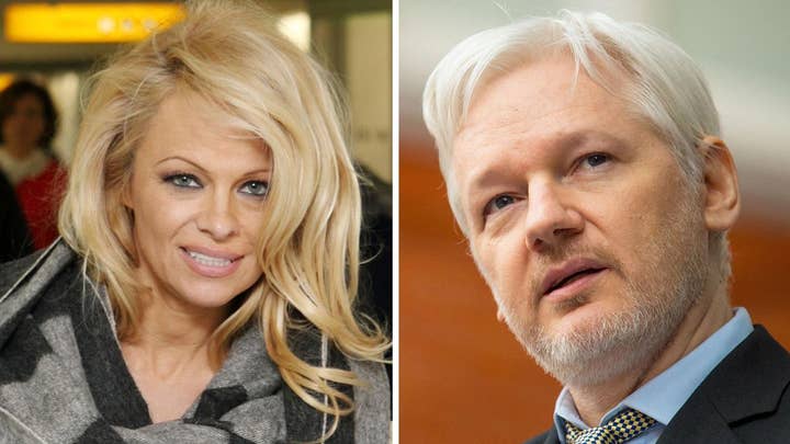 Pamela Anderson writes love letter for Julian Assange