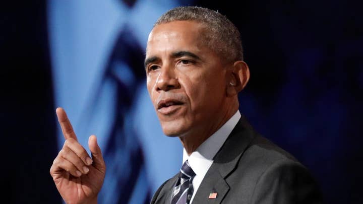 Obama takes aim at Senate's health care bill 