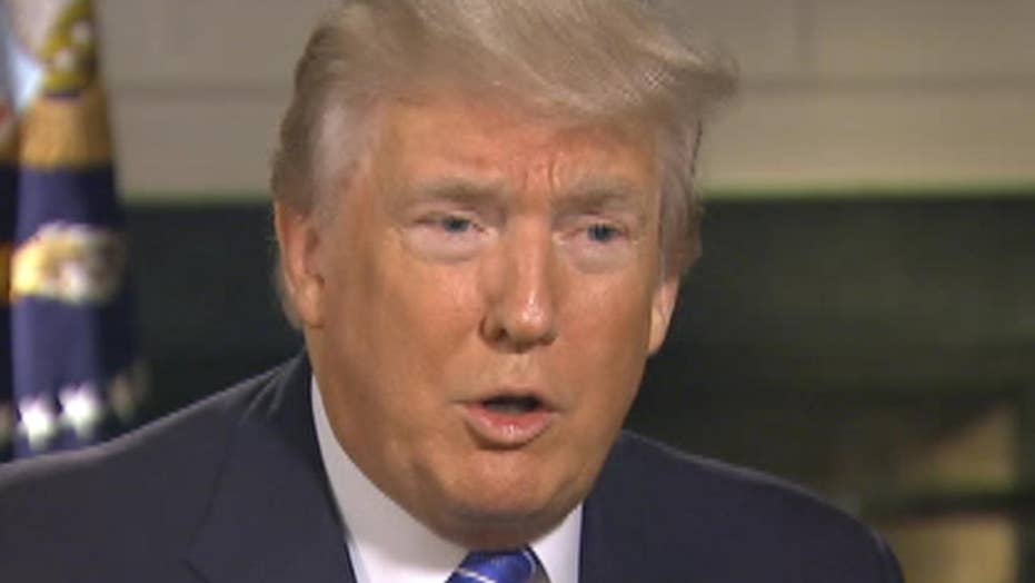 Trump questions Obama's response to Russia information