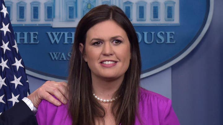 Sarah Huckabee Sanders spars with reporter over 'fake news'