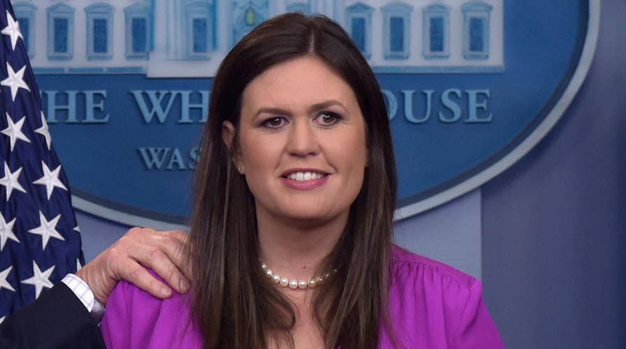 Sarah Huckabee Sanders spars with reporter over 'fake news'