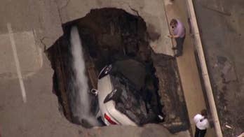 St. Louis sinkhole swallows car
