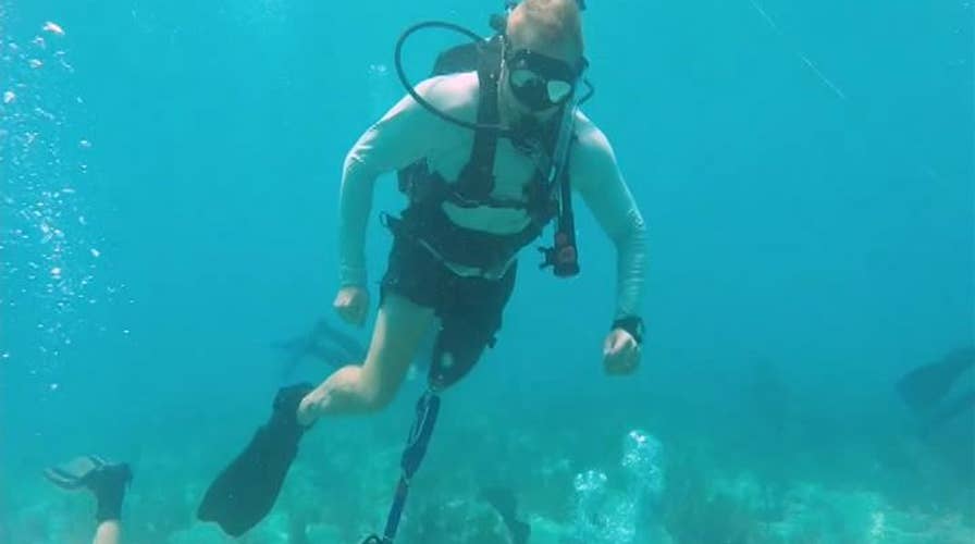 Wounded warriors help save dying coral reef