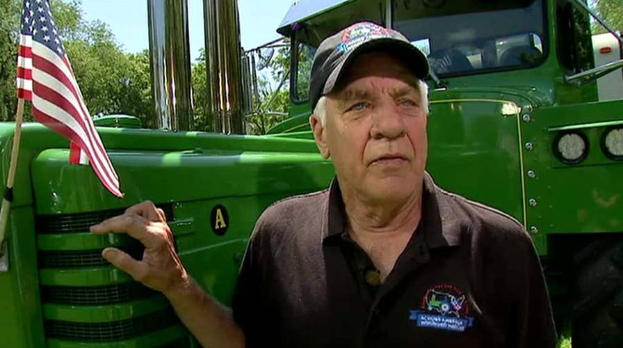 Man drives tractor across the country for wounded veterans