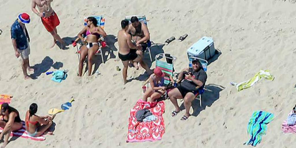 Chris Christie: Cameras catch NJ gov lounging on closed beach