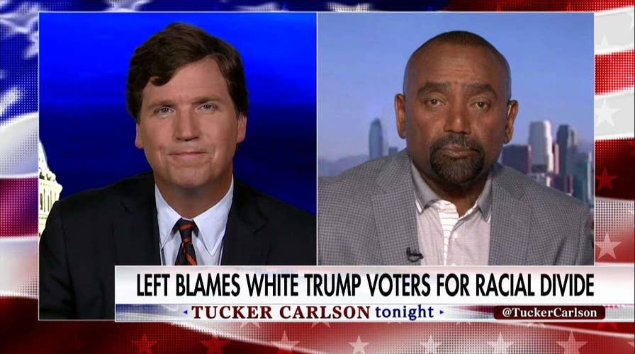 Tucker Talks Race with Rev Peterson