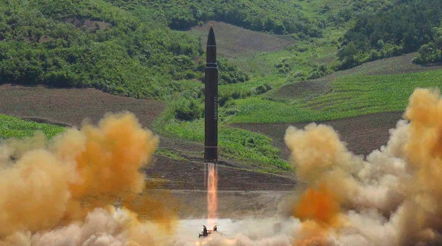 N. Korea claims first long-range missile