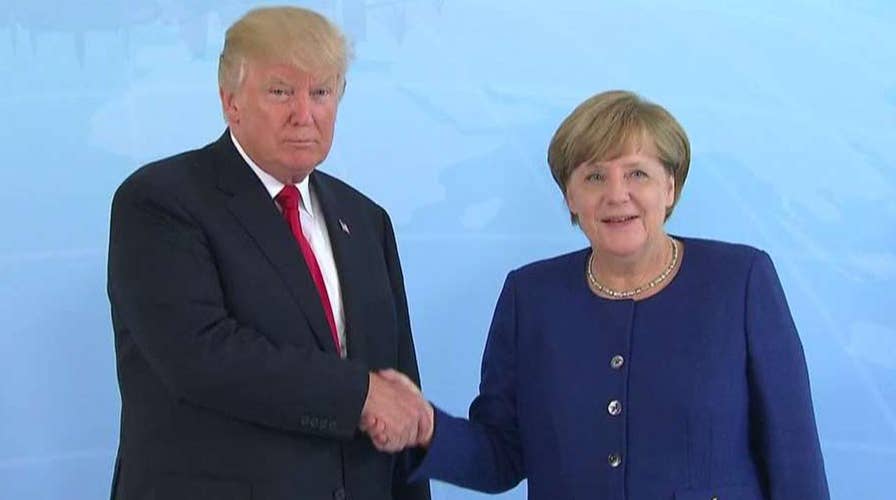 Trump meets with Merkel ahead of G20 summit