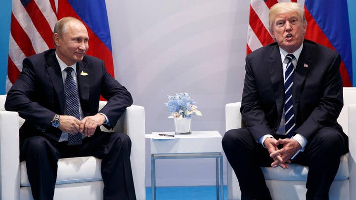 Trump presses Putin on Russian meddling in election